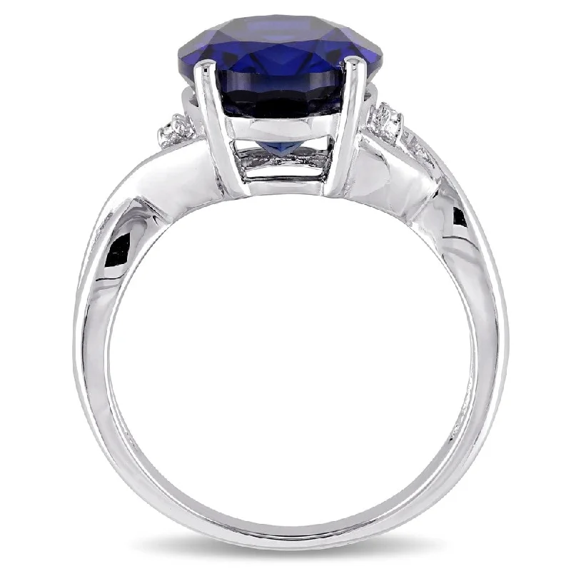 Miadora Sterling Silver Oval-Cut Created Blue Sapphire and Diamond Accent Crossover Ring